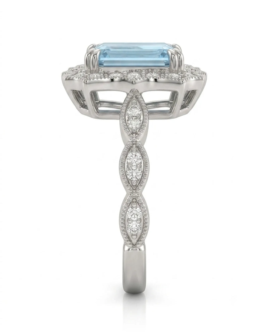 Valoria Crest emerald-cut Aquamarine ring setting in Platinum, side profile with open crown gallery and diamond links | SARATTI