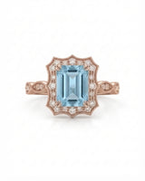 Valoria Crest emerald-cut Aquamarine ring setting in rose gold, front view with scalloped diamond frame | SARATTI