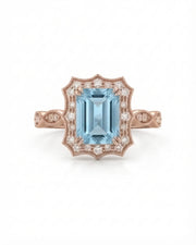 Valoria Crest emerald-cut Aquamarine ring setting in rose gold, front view with scalloped diamond frame | SARATTI
