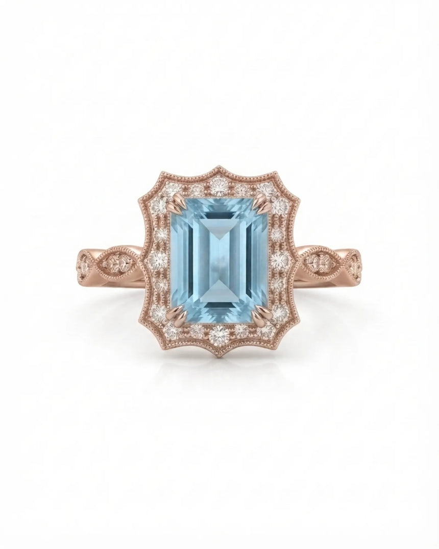 Valoria Crest emerald-cut Aquamarine ring setting in rose gold, front view with scalloped diamond frame | SARATTI