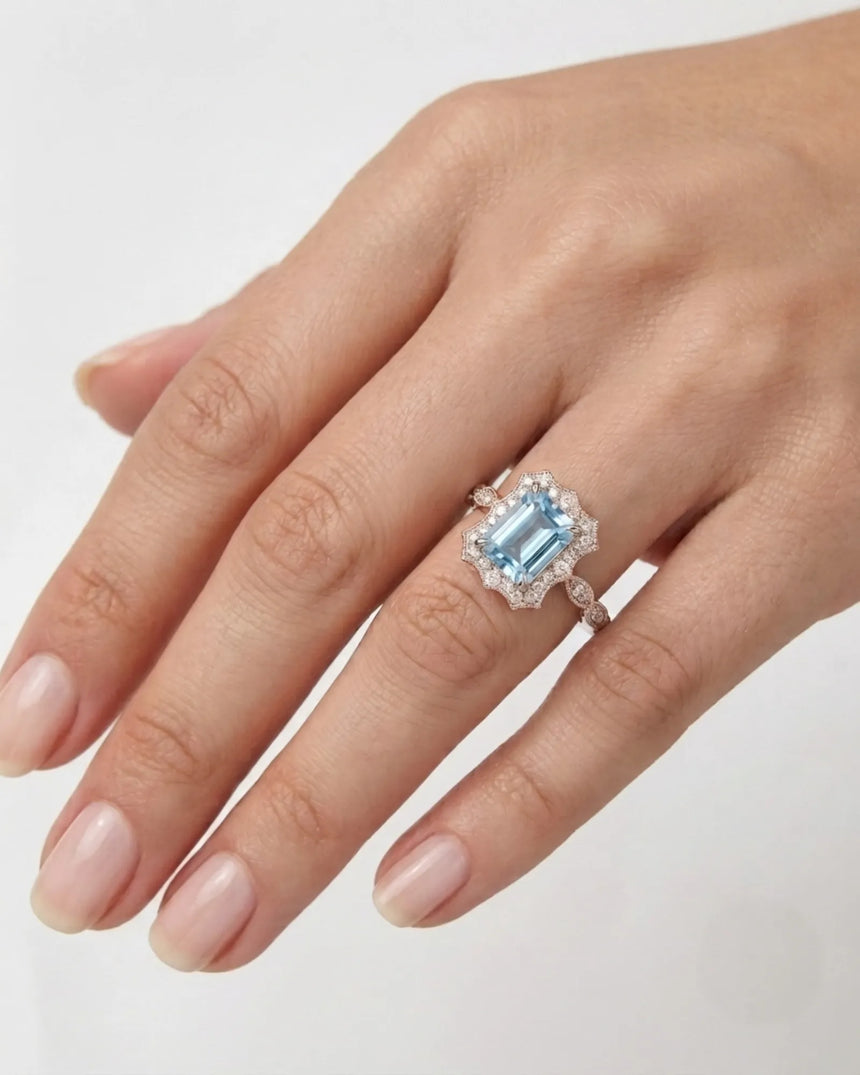 Valoria Crest emerald-cut Aquamarine vintage diamond ring setting in rose gold, worn on hand | SARATTI