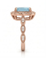 Valoria Crest emerald-cut Aquamarine ring setting in rose gold, side profile with open crown gallery and diamond links | SARATTI