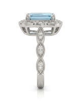 Valoria Crest emerald-cut Aquamarine ring setting in white gold, side profile with open crown gallery and diamond links | SARATTI