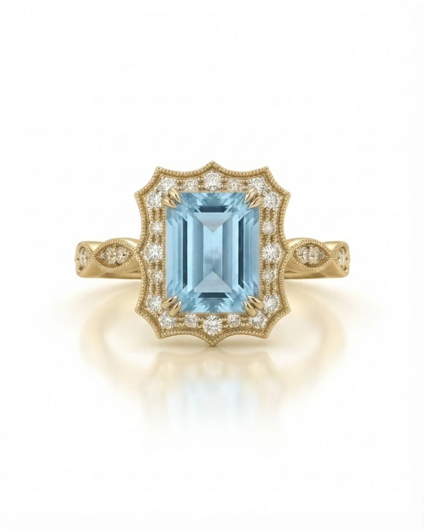 Valoria Crest emerald-cut Aquamarine ring setting in yellow gold, front view with scalloped diamond frame | SARATTI