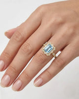 Valoria Crest emerald-cut Aquamarine vintage diamond ring setting in yellow gold, worn on hand | SARATTI