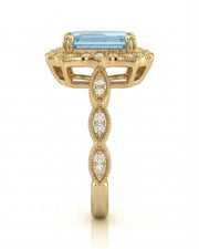 Valoria Crest emerald-cut Aquamarine ring setting in yellow gold, side profile with open crown gallery and diamond links | SARATTI