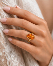 yellow gold Imperial Topaz bezel ring with side diamonds | SARATTI