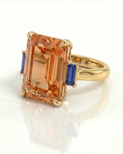 yellow gold Imperial Topaz setting with blue sapphire side stones | SARATTI