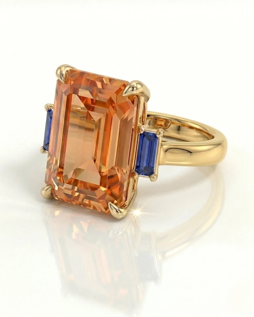 yellow gold Imperial Topaz setting with blue sapphire side stones | SARATTI