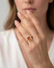 yellow gold Imperial Topaz setting with round brilliant diamond halo | SARATTI