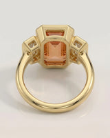 yellow gold emerald cut Topaz bezel setting with bright step-cut diamonds | SARATTI