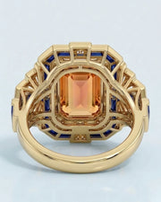 yellow gold emerald cut Topaz setting with sapphire fan shoulders | SARATTI