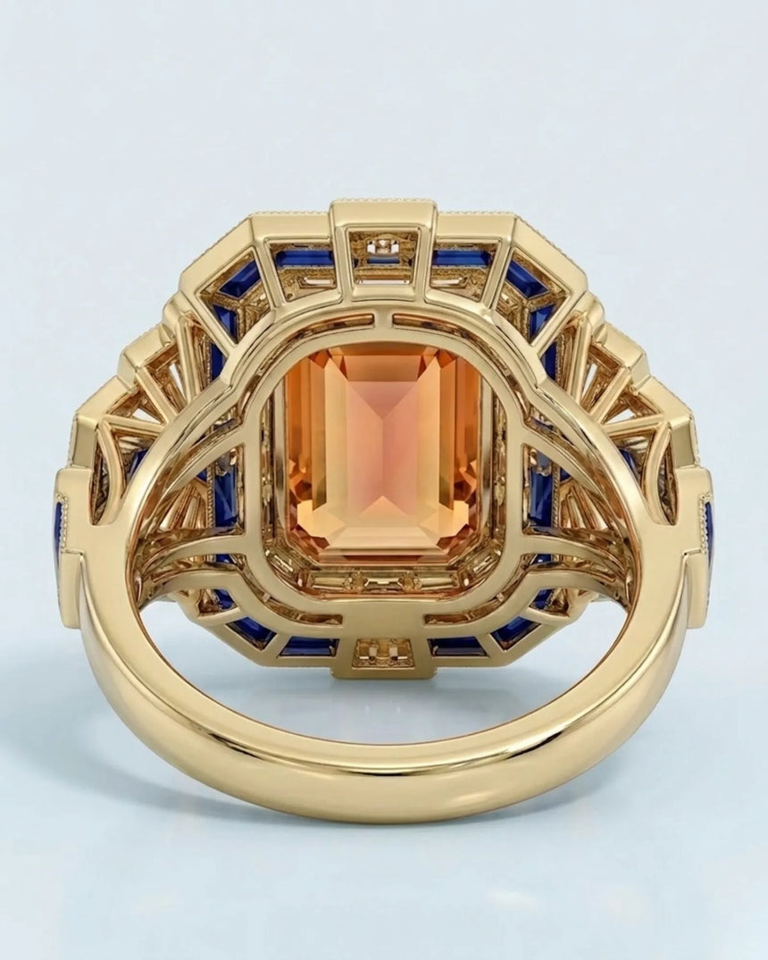 yellow gold emerald cut Topaz setting with sapphire fan shoulders | SARATTI