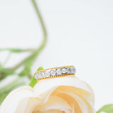 Two Tone Wedding Band Womens with Diamonds against Floral Background | Modern Gem Jewelry | Saratti