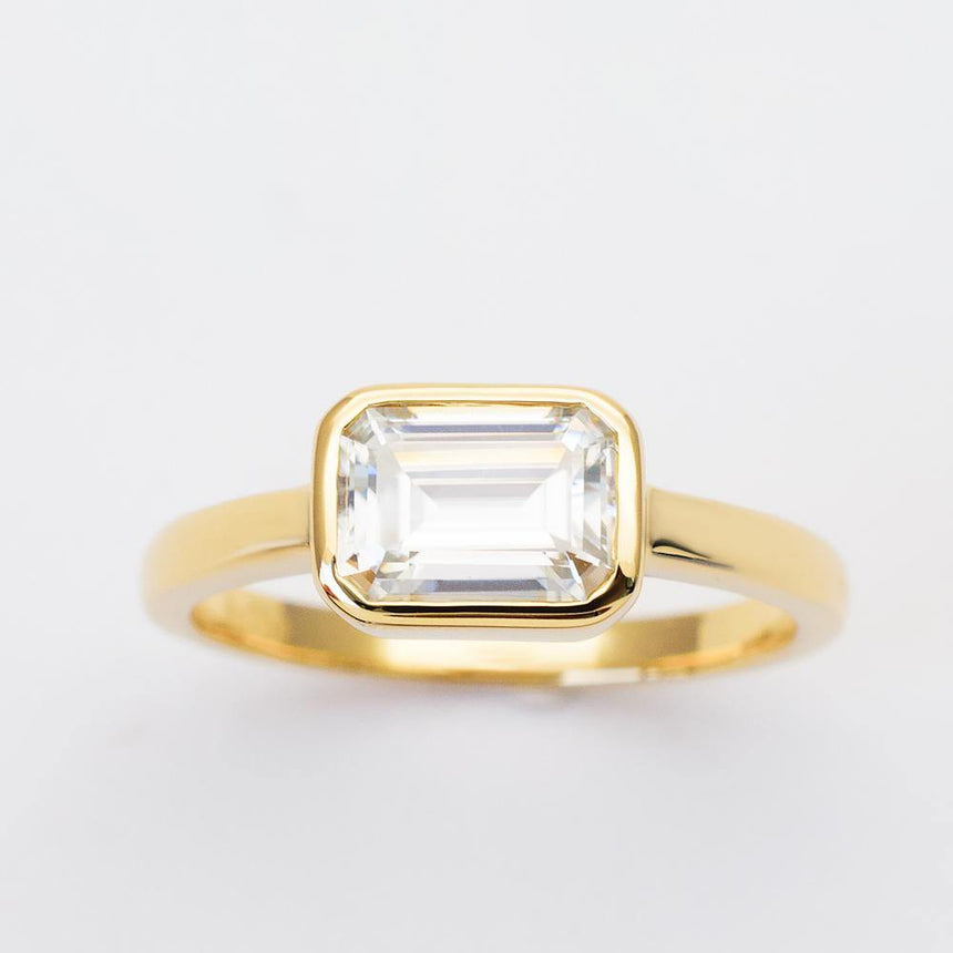 Elegant Natalia Emerald Cut Diamond Ring in Yellow Gold | Modern Gem Jewelry | Saratti