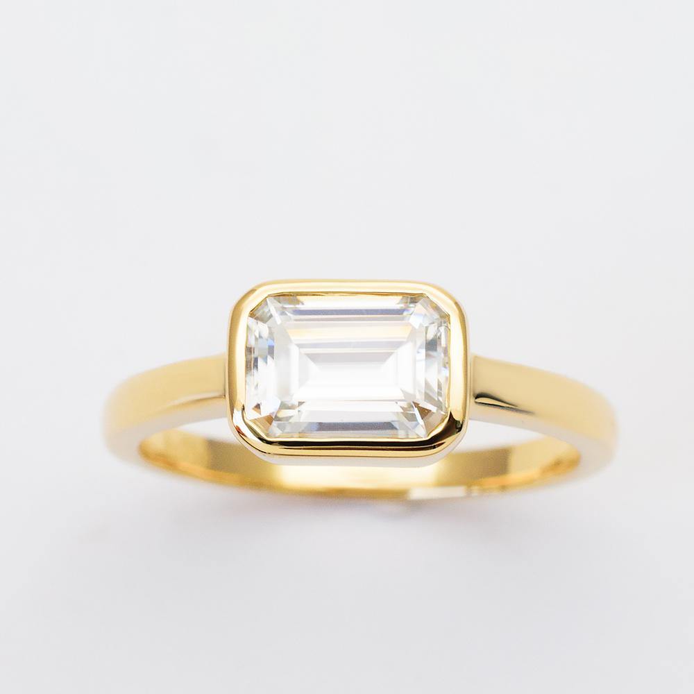 Elegant Natalia Emerald Cut Diamond Ring in Yellow Gold | Modern Gem Jewelry | Saratti