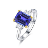 Tanzanite Engagement Ring with Diamonds | 10 carat Tanzanite Three Stone Ring on White Background | Modern Gem Jewelry | Saratti