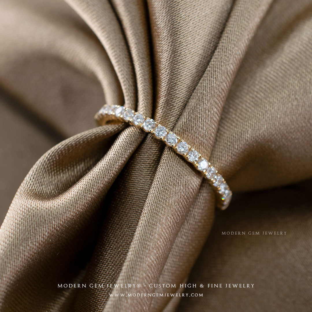 Thin Pave Set Diamond Wedding Band in Yellow Gold with Diamonds on Silk Sheets| Modern Gem Jewelry | Saratti 