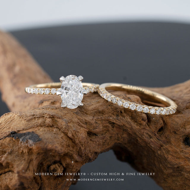 Oval moissanite engagement ring and matching wedding band