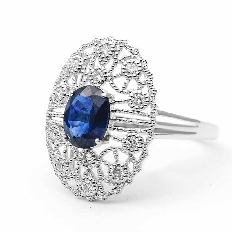 Stunning Art Deco Inspired Sapphire Ring against White Background - Sapphire Engagement Ring Settings and Styles for 2023 - Saratti