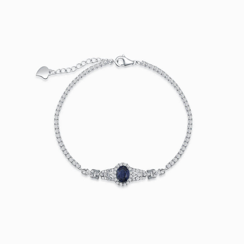 Stunning Regal Blue Sapphire Bracelet with Diamond Accents on white background - Elevate Your Style - The Finest September Birthstone Bracelets of 2023 – Saratti