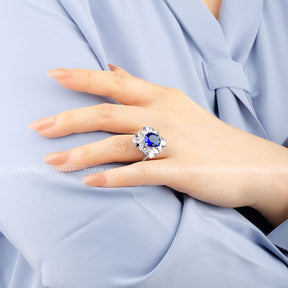 Oval Royal Blue Cocktail Ring in 18K White Gold on Model's Finger | Saratti 