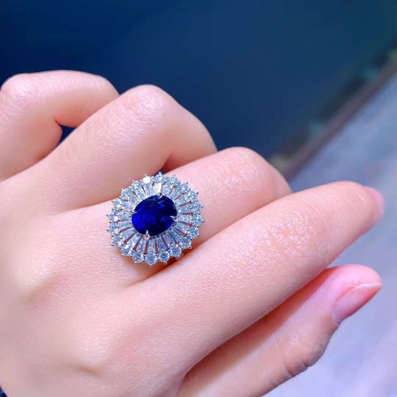 Modern Triple Diamond Halo Regal Blue Sapphire Ring on Model’s Finger - Saratti’s 2023 Selection of Women's Sapphire Rings - Elevate Your Elegance
