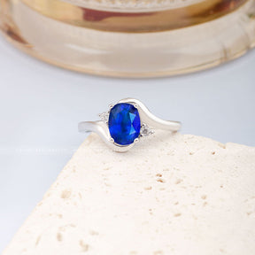 Unique Oval Sapphire Promise Rings | Oval Royal Blue Natural Sapphire and Dimaond Three Stone Ring in 18K White Gold | Modern Gem Jewelry | Saratti 
