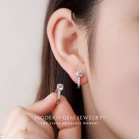 Diamond Hoop Earrings on ear and hand, designed in 18K White Gold | Modern Gem Jewelry