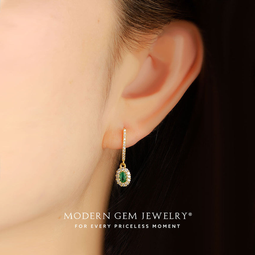 Model wears Retro Style Emerald and Diamond Earrings in 18K Yellow Gold For Women | Modern Gem Jewelry