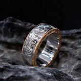 Wave engraved 18K two tone gold band