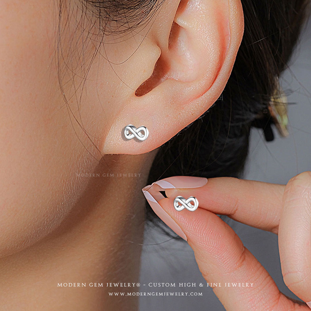 Delicate White Gold Infinity Stud Earrings | Saratti