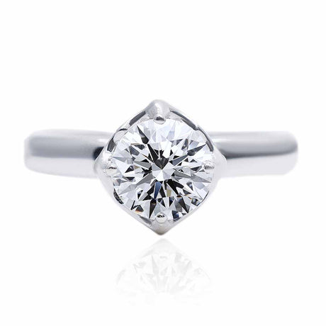 Brilliant Round Four Prong Engagement Ring in 18K White Gold 