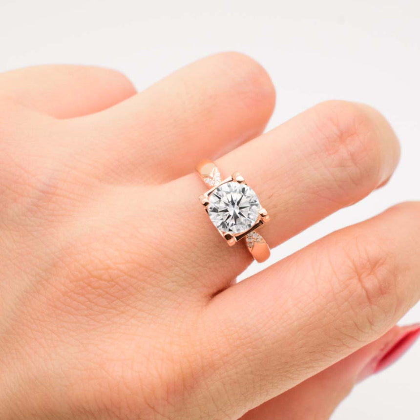 rose gold prong set diamond engagement ring 