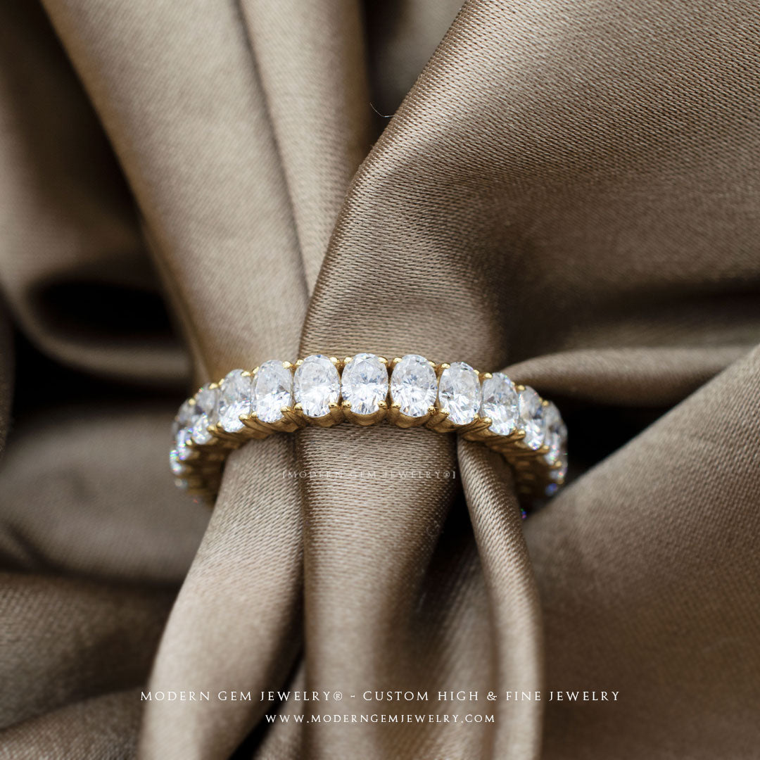 Oval Diamond Wedding Band in 18K Yellow Gold in silk sheet | Modern Gem Jewelry | Saratti 