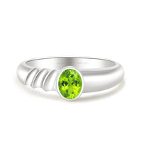 Peridot Engagement Ring In Bezel Set White Gold