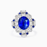 Oval Royal Blue Cocktail Ring with Sapphire and Diamond Accent Stones in 18K White Gold | Saratti 