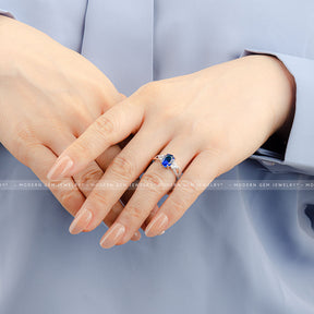 Stunning Oval Royal Blue Sapphire and Diamond Three Stone Ring | Modern Gem Jewelry | Saratti