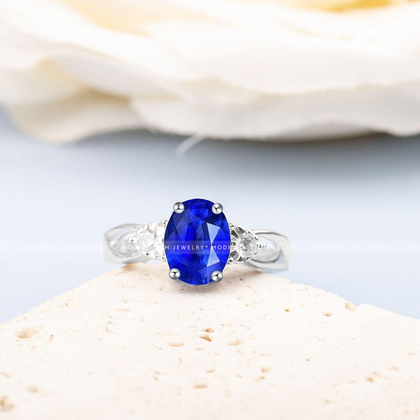 Elegant Oval Royal Blue Sapphire and Diamond Three Stone Ring | Modern Gem Jewelry | Saratti