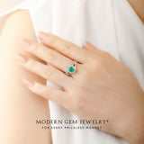 Split Shank Engagement Ring with Green Emerald Stone | Modern Gem Jewelry