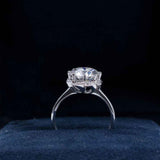 Petal Inspired Pronged Round Moissanite Ring 