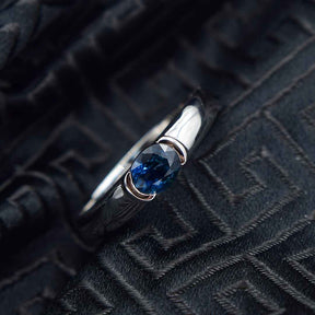Elegant Bezel Set Oval Blue Sapphire White Gold Ring | Modern Gem Jewelry | Saratti