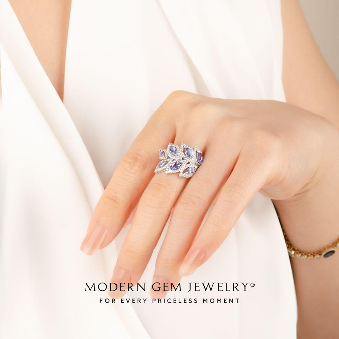 Woman Wearing Tanzanite and Diamonds Ring in White Gold | Modern Gem Jewelry | Saratti
