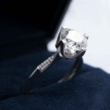 Minimalist Four Prong Moissanite Engagement Ring 