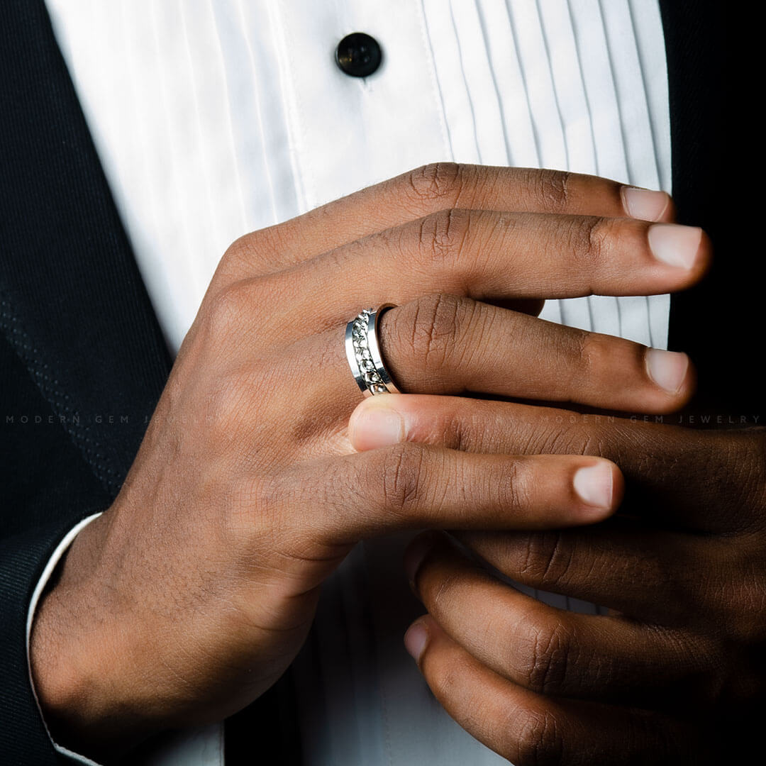 Model Flexes the El Cubano Cuban Link Ring  and White Gold For Men | Custom Made Wedding Bands | Modern Gem Jewelry | Saratti