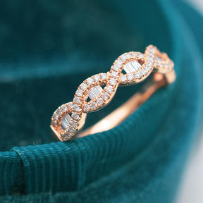 Rose Gold Eternity Band with Baguette and Pave Set Diamonds on Green Silk | Modern Gem Jewelry | Saratti 