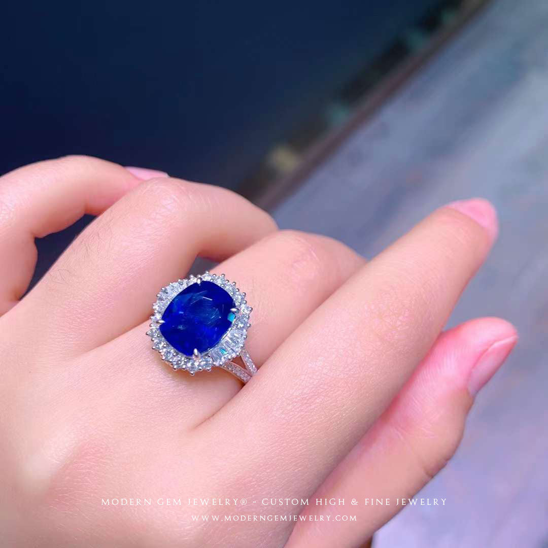 White Gold Sapphire Ring | 5 carat Unheated Cushion Royal Blue | High End Jewelry Split Shank Ring on Woman's Finger  | Modern Gem Jewelry